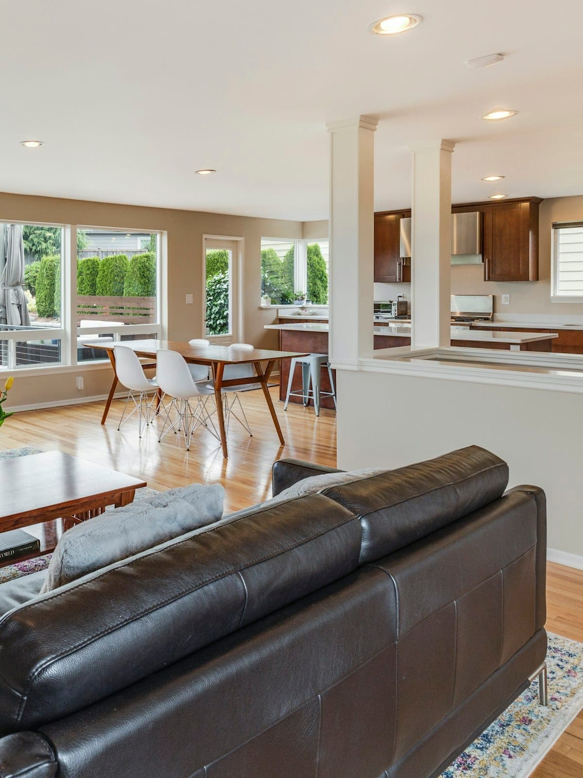 A well-kept Negril villa with natural light — tall and calm, the sea beyond the window